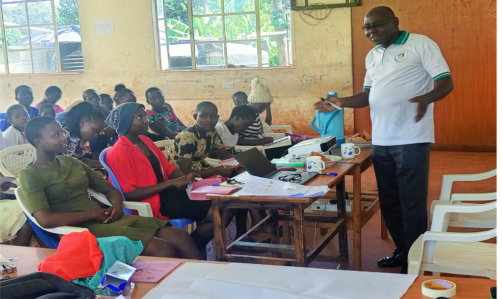 A trainer counseling girls on how to achieve their dreams in life